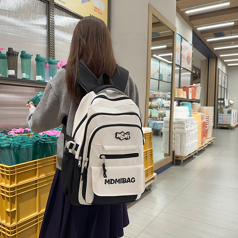 Mochilas escolares niñas de secundaria de alto valor facial nicho estilo insfeng estudiantes de secundaria de gran capacidad chocan con el color de los estudiantes de primaria para reducir la carga mochila