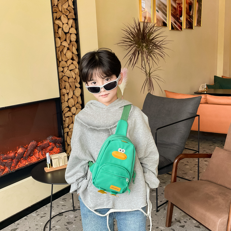 Bolsa infantil 2025, nueva bolsa de viaje estilo coreano para niñas, linda bolsa de pecho con diseño de pato de dibujos animados, bandolera para niños