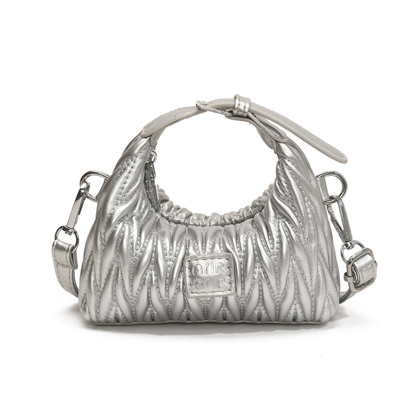 Bolsa de hombro de chicas plegadas de moda simple color sólido mini bolso de bebé 2025 nuevo bolso infantil transfronterizo
