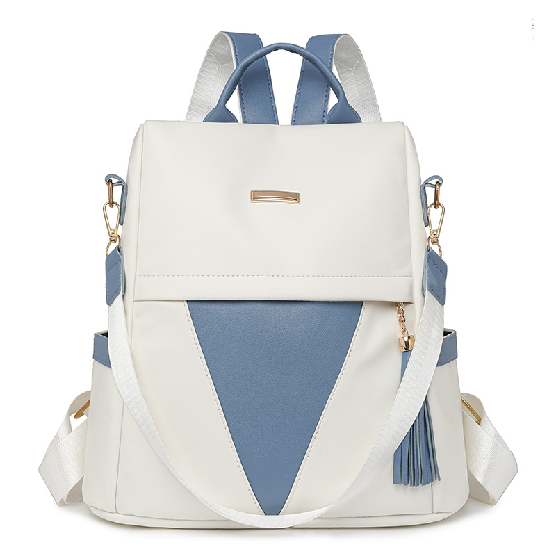 Mochila antirrobo para mujer 2024 nueva moda en contraste color mochila de cercanías de gran capacidad para mujer mochila con borlas multifuncional