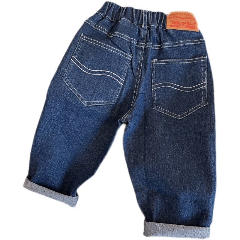 Niños 2026 nuevos jeans coreanos pantalones de niños primavera y otoño ropa guapo bebé de otoño pantalones largos versátiles