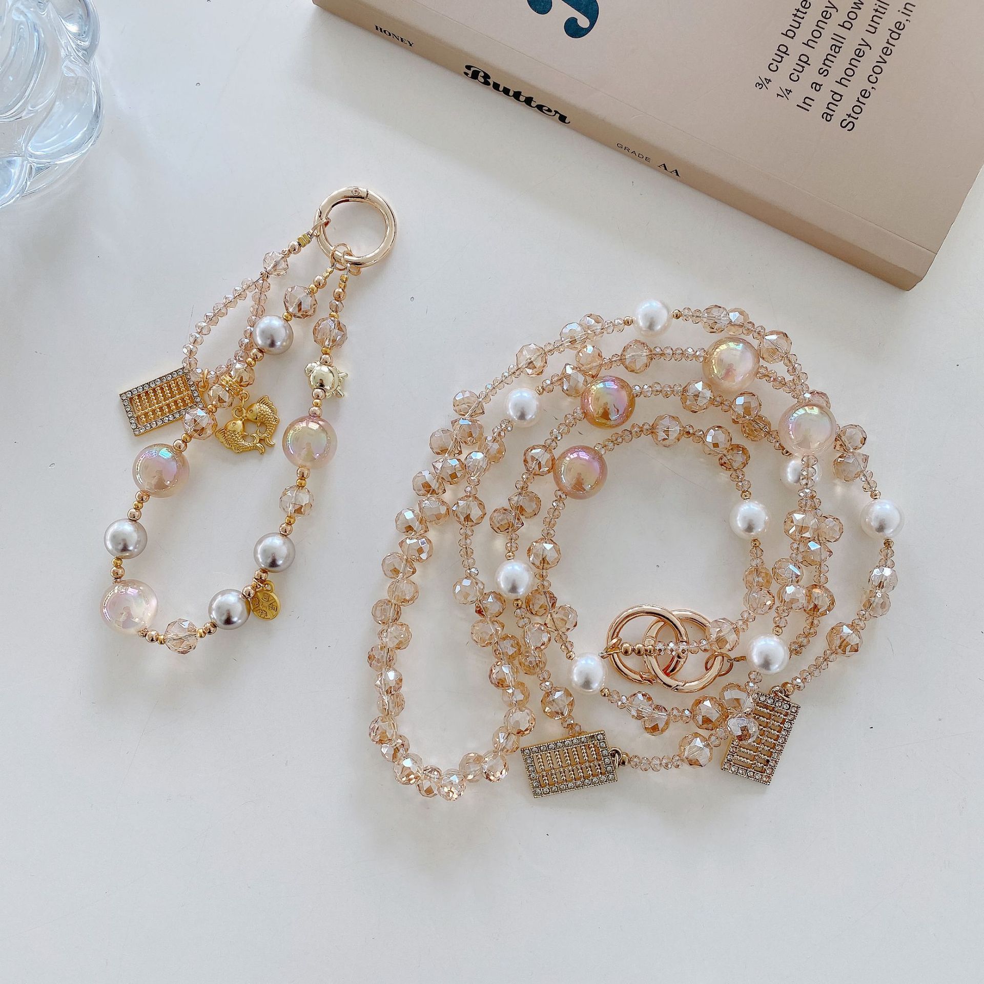 Boutique hecho a mano de alta gama cadena de teléfono móvil serie ábaco cadena larga y corta cordón de teléfono móvil de moda colgante de mensajero largo y corto