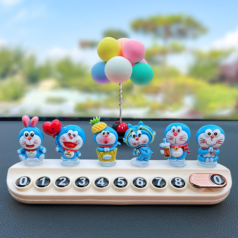 Doraemon decoración de accesorios de coche nuevo coche de niña creativo lindo muñeca de consola central decoración de coche