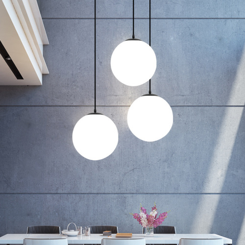 Modern minimalist spherical glass pendant lights for restaurants, bar counters, commercial spaces, clothing stores, and milk tea shops—perfect for hallway illumination.