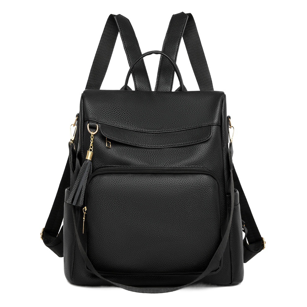 2024 nuevas damas casuales de cuero suave mochila antirrobo moda borla color de contraste mochila de viaje de gran capacidad al por mayor