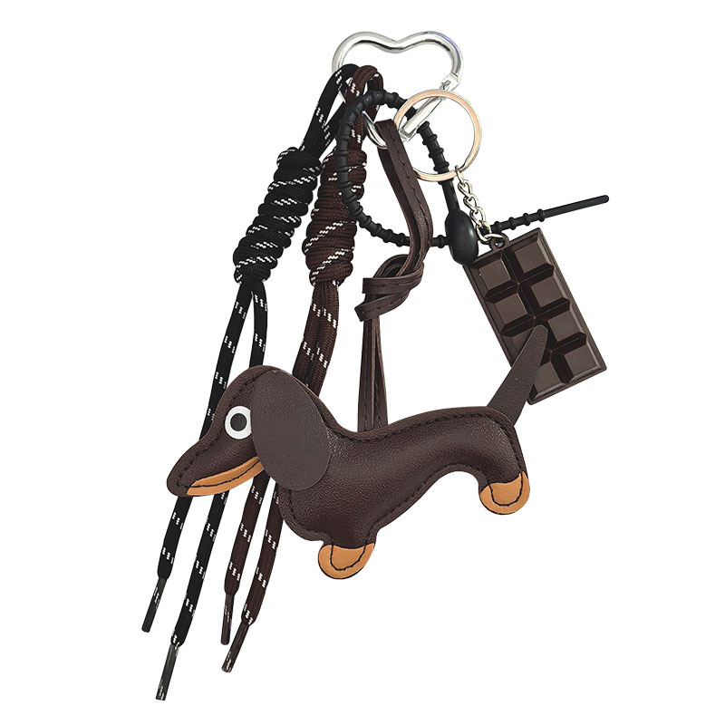 現物のソーセージ犬のストラップが可愛いルースと同じ革の子犬のバッグのストラップのカップルのキーホルダーの自動車のストラップ