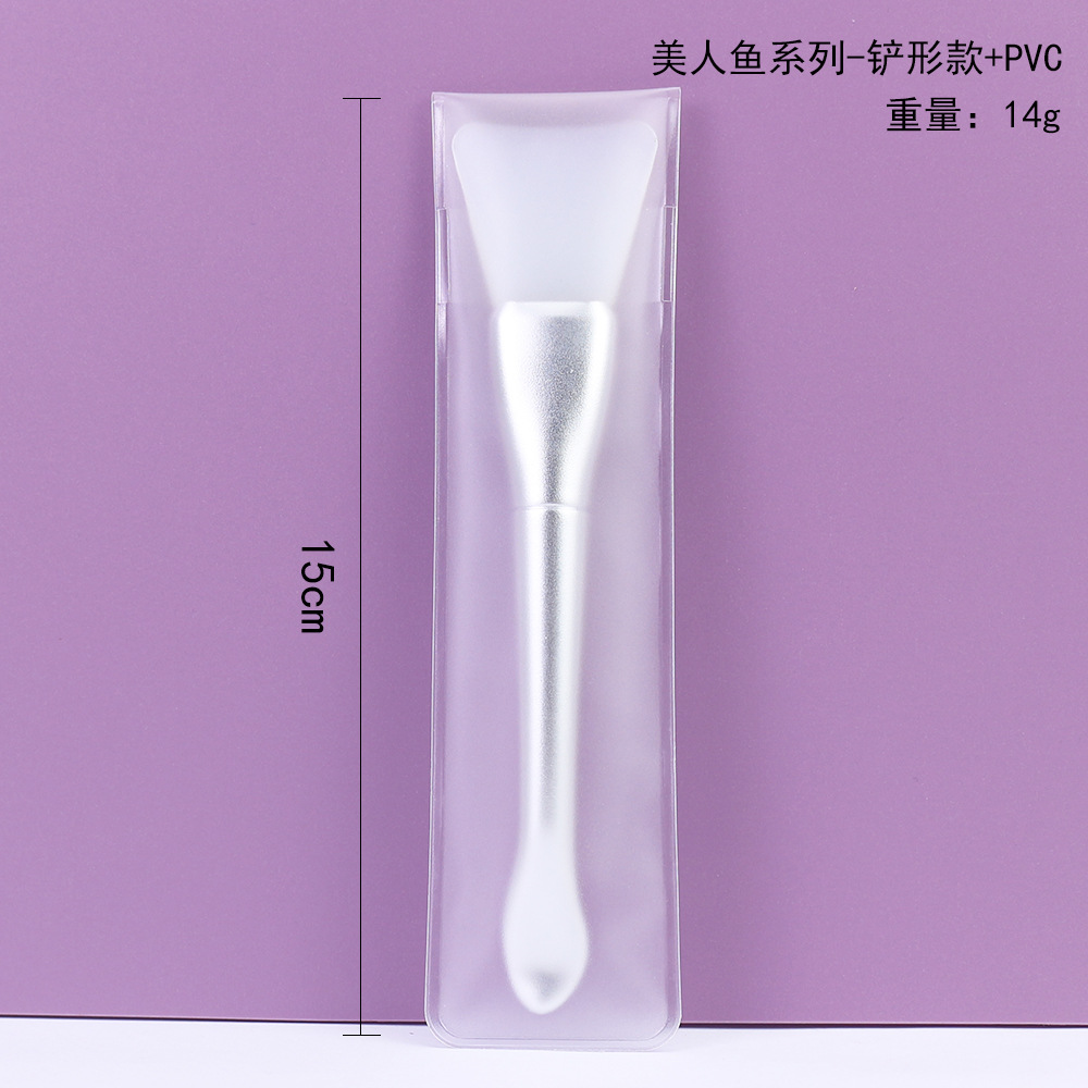 Cepillo de mascarilla de silicona tipo pala de cola de pez de una pieza plateada paquete de PVC