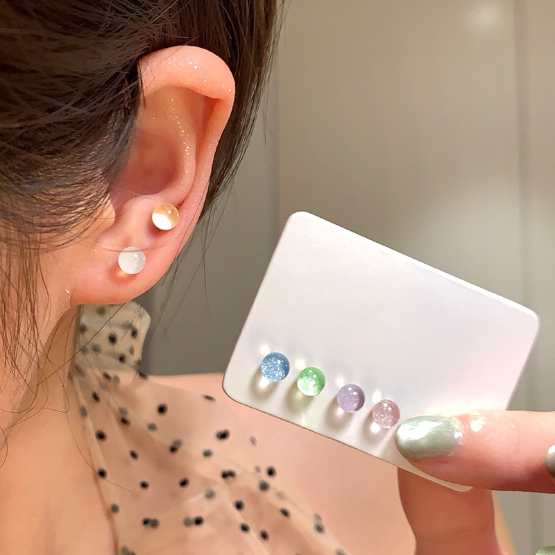 Pendientes redondos de color de aguja de plata Pendientes frescos y dulces Pendientes de todo fósforo de moda simple para mujer