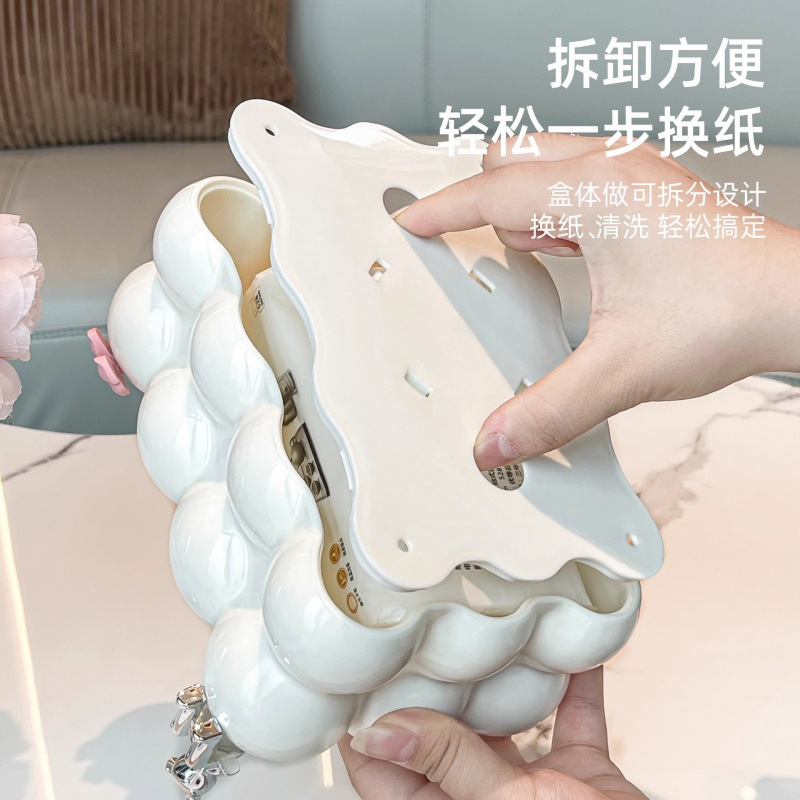 高級感のある収納ケースの新型の軽贅沢家庭用創意トイレティッシュボックスのリビングのテーブルの上に紙ナプキンを引き出します。