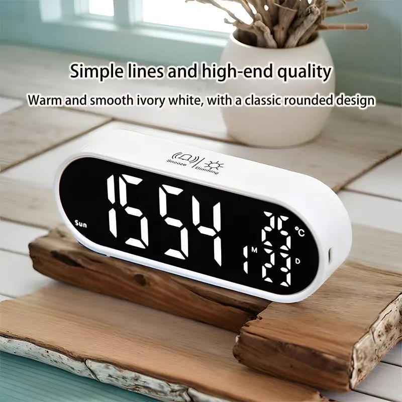 Reloj despertador electrónico ovalado de plástico, venta directa de fábrica, multifuncional, se puede usar como espejo, estilo coreano simple.