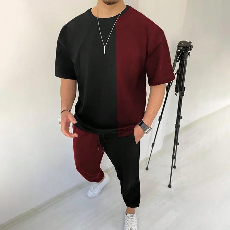 男性のスーツの夏の青年の半袖のtシャツのストライプは色のゆったりした弾力の薄い運動のズボンの2つのセットをつづり合わせます。|undefined
