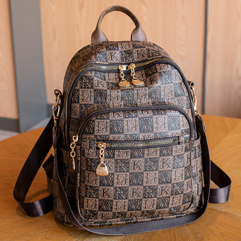 Ins celebridad de Internet mochila femenina 2024 nueva moda salvaje damas mochila de cuero suave mochila de viaje de ocio al aire libre