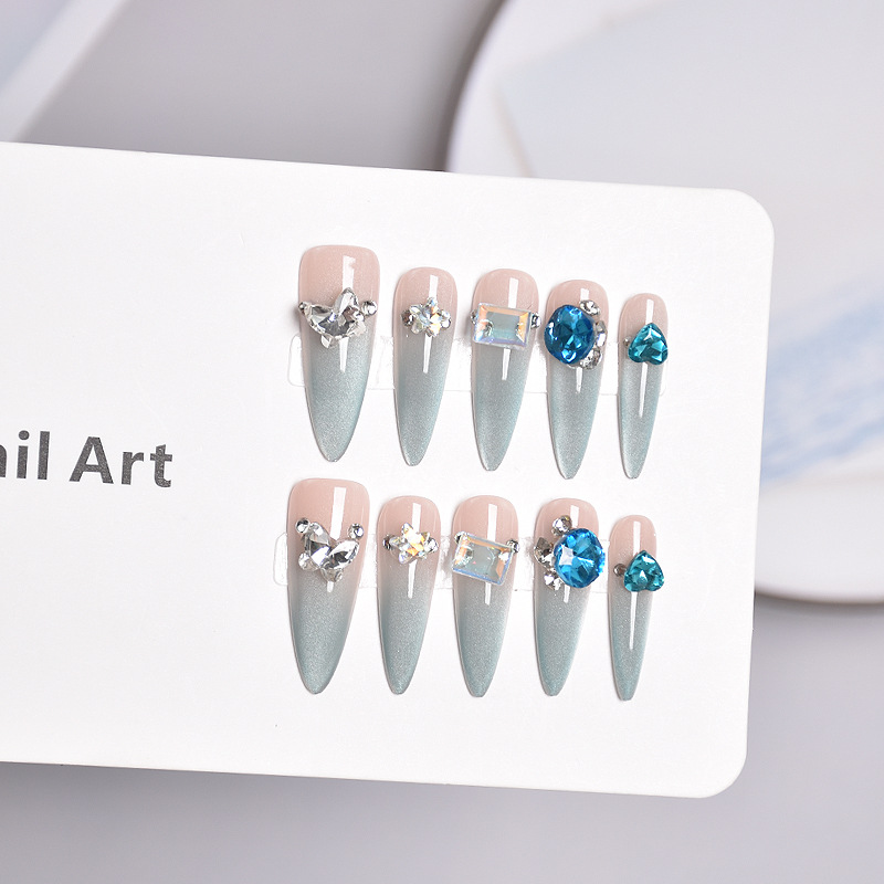 10 nuevas piezas de arte de uñas, ojos de gato azul claro, piezas de uñas de vestir, uñas de punta larga terminadas, pegatinas hechas a mano de la industria pesada, parches de uñas de diamantes