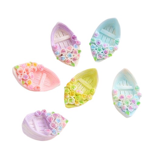 Cartoon DIY resin accessories and decorations: flowers, small boats, cream glue, handmade hair clips, phone cases, shoe clips, and other accessories.
