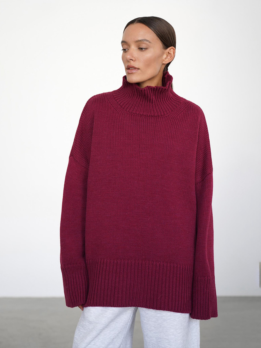 Suéter de cuello alto transfronterizo para mujeres 2025, Europa y los Estados Unidos de otoño y invierno explosivo color sólido jersey de punto de cuello alto suéter suelto para mujeres