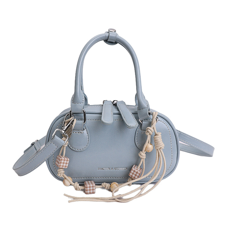 Bolsa de hombro coreana de diseño de nicho simple 2026 nueva moda femenina de tendencia diaria textura de viaje popular bolso de hombro