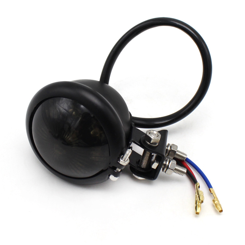 Accesorios de la motocicleta retro modificado crucero Príncipe locomotora metal redondo pequeña luz trasera luz freno LED Universal