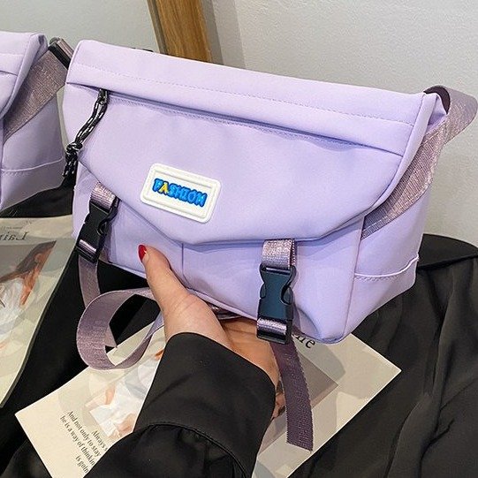 日系戶外郵差包2024新款女士包包潮ins時尚工裝風情侶單肩斜挎包