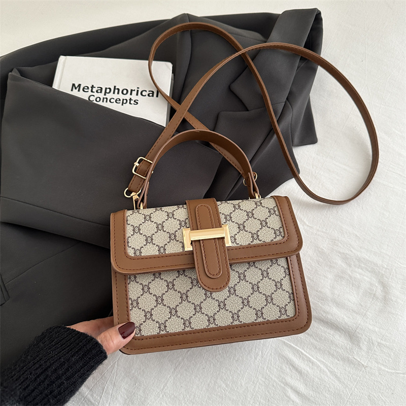 2025 nueva moda simple de alto valor de cara bolso de hombro de moda retrógrada impresión de personalidad bolso de viaje portátil pequeño