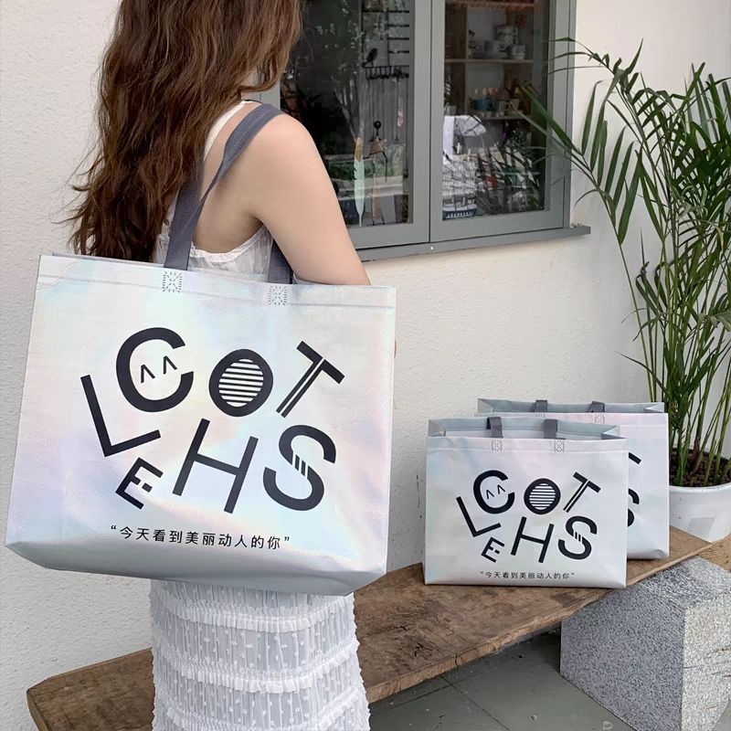 镭射手提袋无纺布袋服装店袋子衣服包装袋单肩背女装鞋高档购物袋