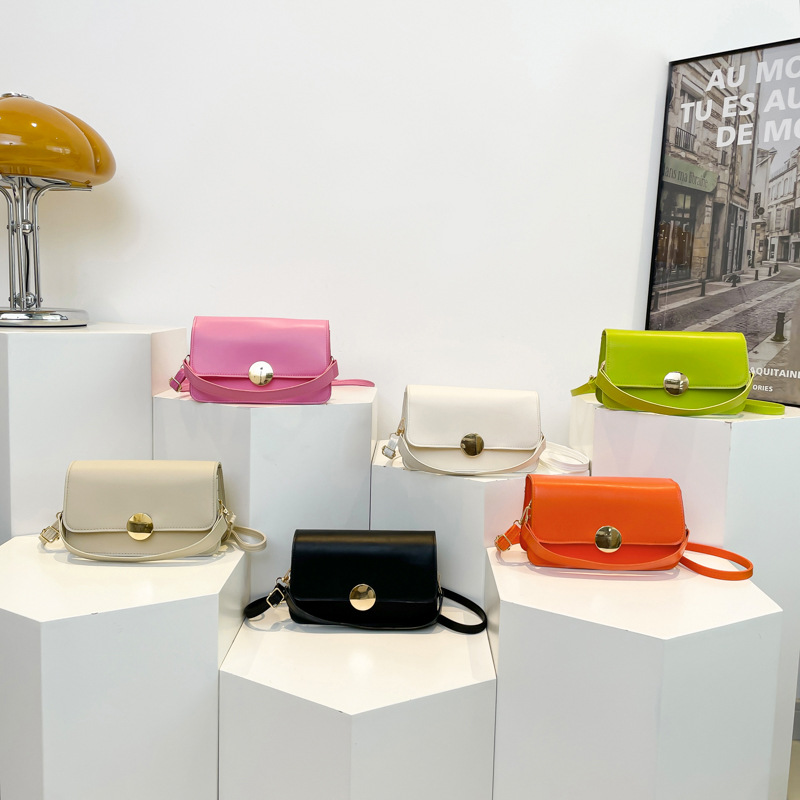 Bolso de moda coreano 2025 nuevo nicho de textura de hombro pequeño bolso cuadrado de color caramelo bolso de viaje de moda