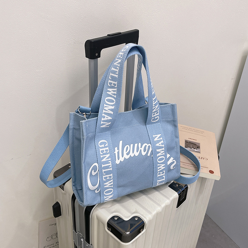 GentleWoman hombro letras bolso de lona portátil 2025 nuevo tailandés nicho transfronterizo bolso de hombro