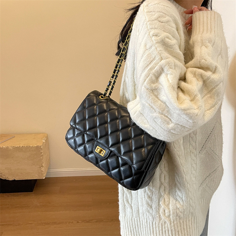 Sentido avanzado xiaoxiangfeng lingge Chain 2024 nuevos bolsos de color sólido mujeres soft Fashion 100 bolsos de hombro y axila