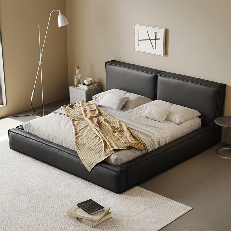 Cama de cuero genuino cama suave negro dormitorio principal de alta gama elegante tofu bloque cama doble 1,8 m italiano minimalista simple cama de boda