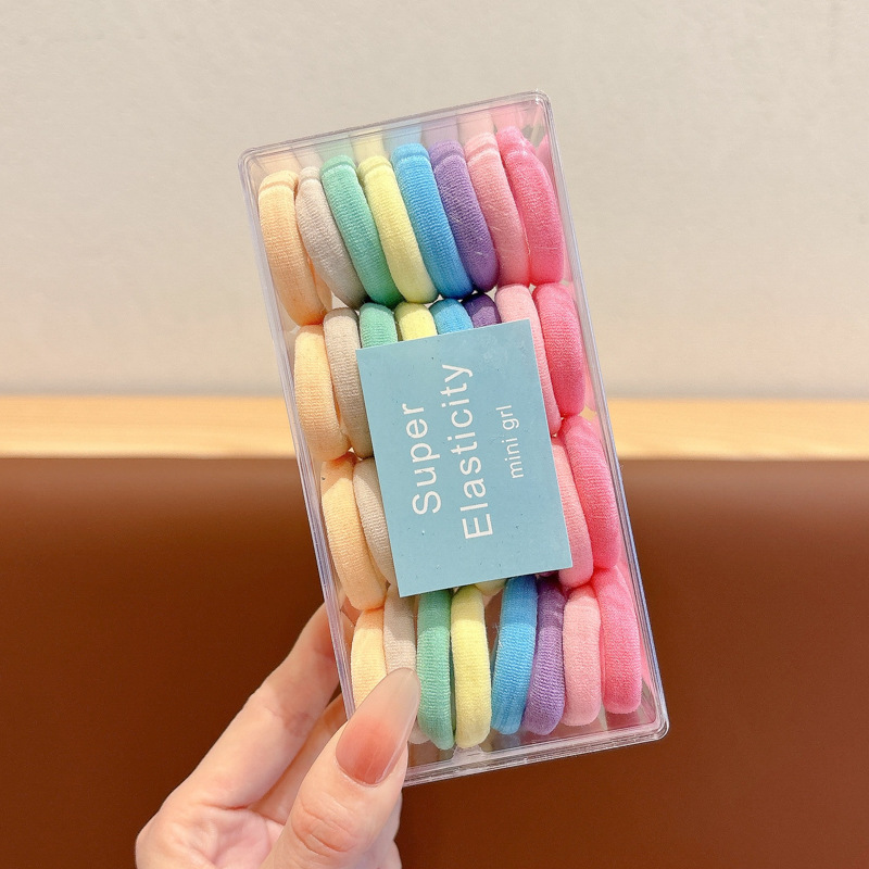 2025 nuevo anillo de cabello para niños de color sólido grueso toalla gruesa cuerda de cabello no es fácil de romper elástica cola de caballo tocado de banda de goma