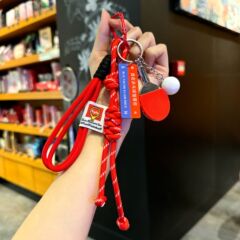 Iu系卓球のキーホルダーは友達にバックパックを掛けて高級感のあるバスケットボールのサッカーの卒業プレゼントを卸売りします。