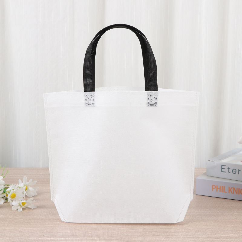 Bolsas de tela no tejida en blanco en stock, bolsas de tela no tejida portátiles, bolsas de prenda, logotipo de impresión image 9