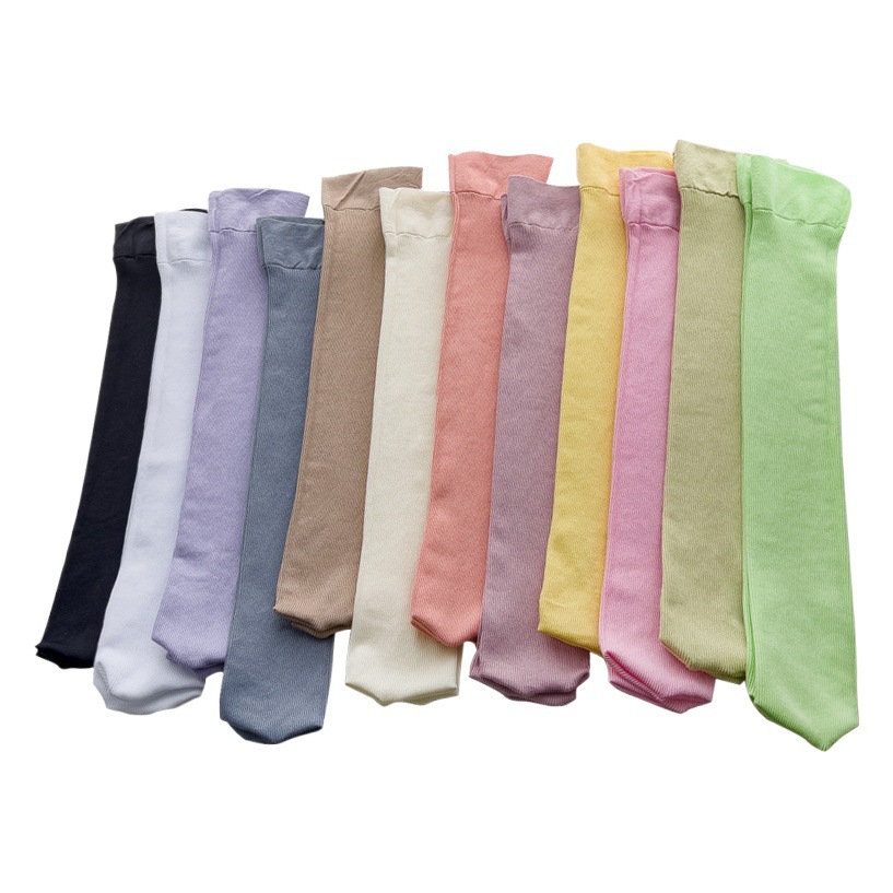 Primavera y verano nuevo color puro calcetines de compresión de pantorrilla para mujeres ins estilo japonés estilo universitario adelgazamiento chica medias fábrica al por mayor