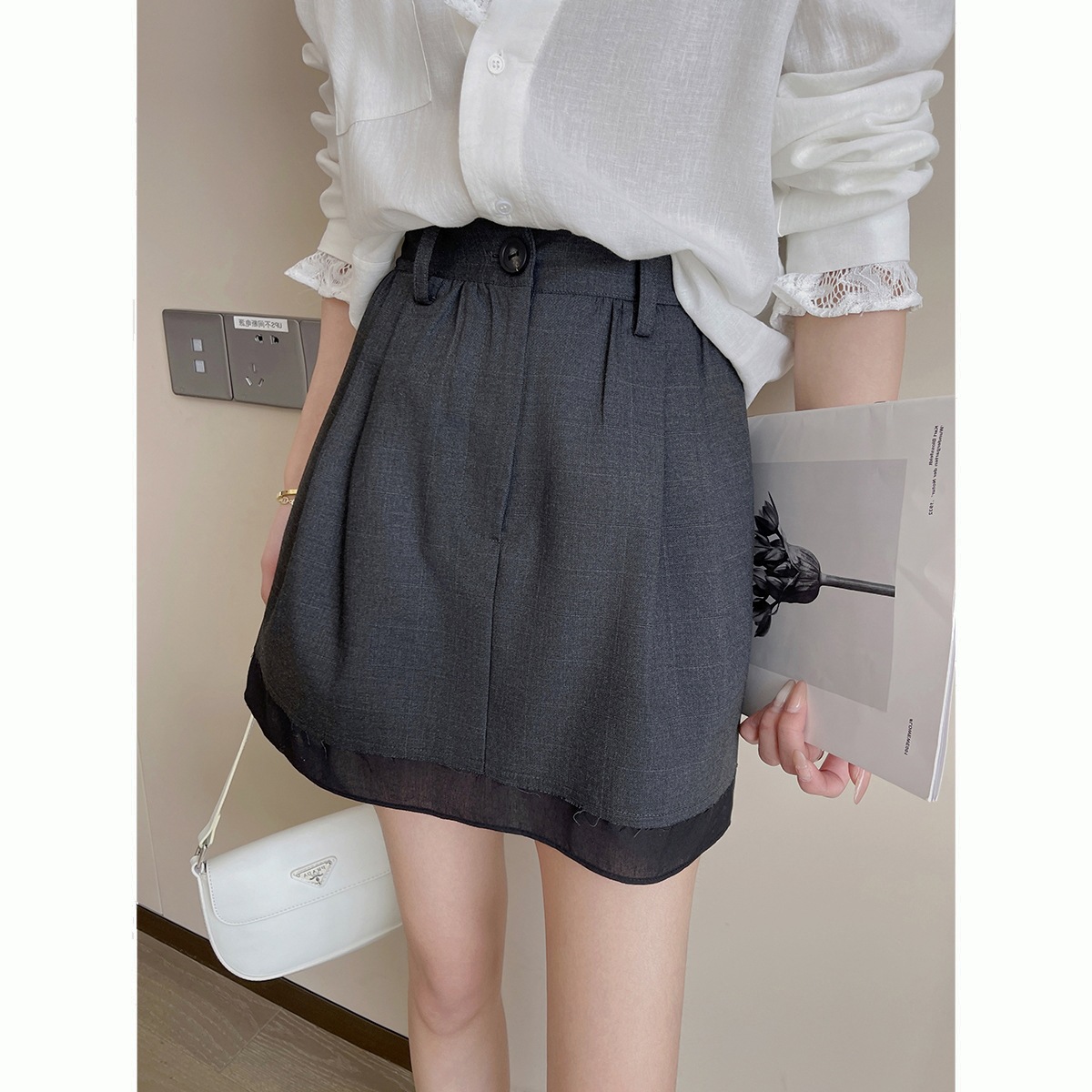 春季2025新款简约时尚气质百搭a字小短裙法式黑色高腰半身裙女