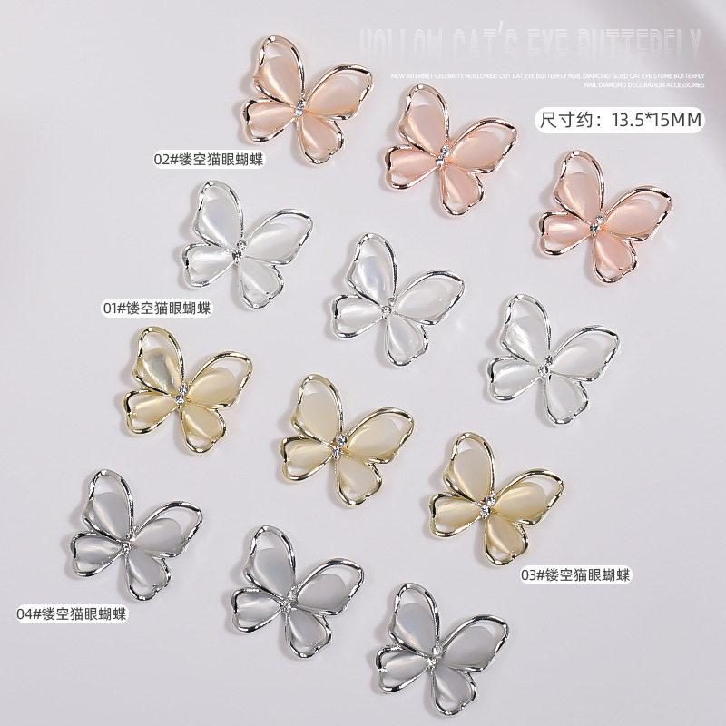 Uñas de cristal gato ojo mariposa aleación joyería en línea celebridad uñas hueco mariposa desgaste accesorios de uñas al por mayor