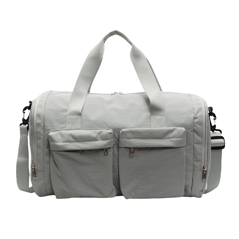 Bolsa de viaje de gran capacidad de textura retro bolso de almohada de moda 2025 nuevo bolso de hombro universal bolso de viaje