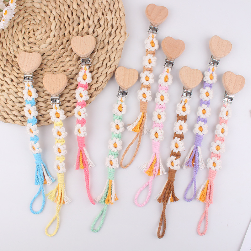 Productos para bebés, clips de chupete de haya de amor de dibujos animados, cadena de chupete de cuerda de algodón de margarita tejida a mano creativa