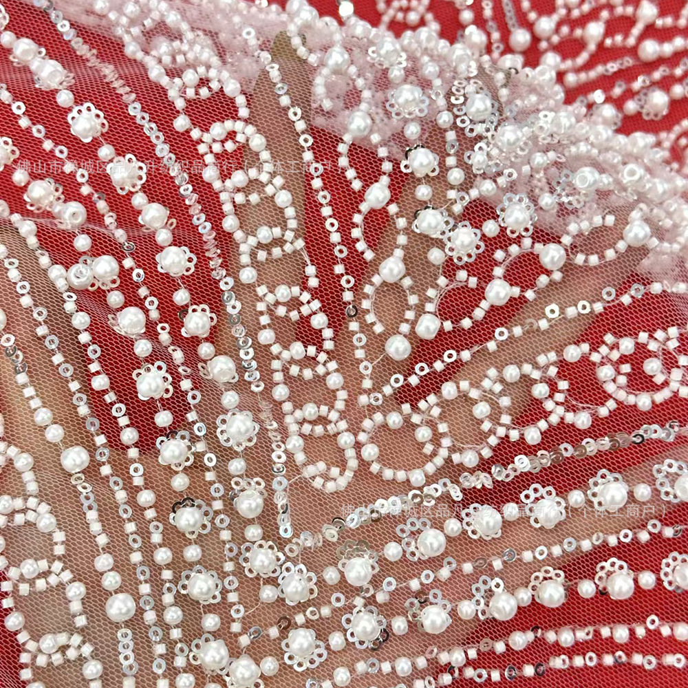 Tejido bordado Gao Ding perla vestido de moda cadena de perlas vestido fabricantes de tela al por mayor