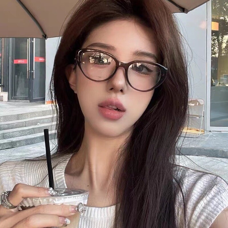 韓国系のレトロな近視のメガネの女性のアメリカの猫の目の変色のサングラスの新型の青い光の黒い枠のすっぴんの卸売りのメガネ|undefined