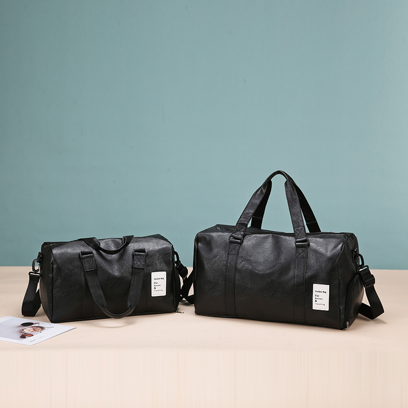 Bolsa de viaje multifuncional para exteriores Bolsa de gimnasio de color sólido con textura de pu de gran capacidad Bolsa de almacenamiento de mensajero de un solo hombro de ocio