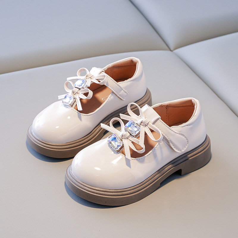 Zapatos de cuero para niñas 2025 otoño nuevo arco infantil zapatos de princesa de estilo extranjero zapatos de diamante brillante mary zapatos de moda