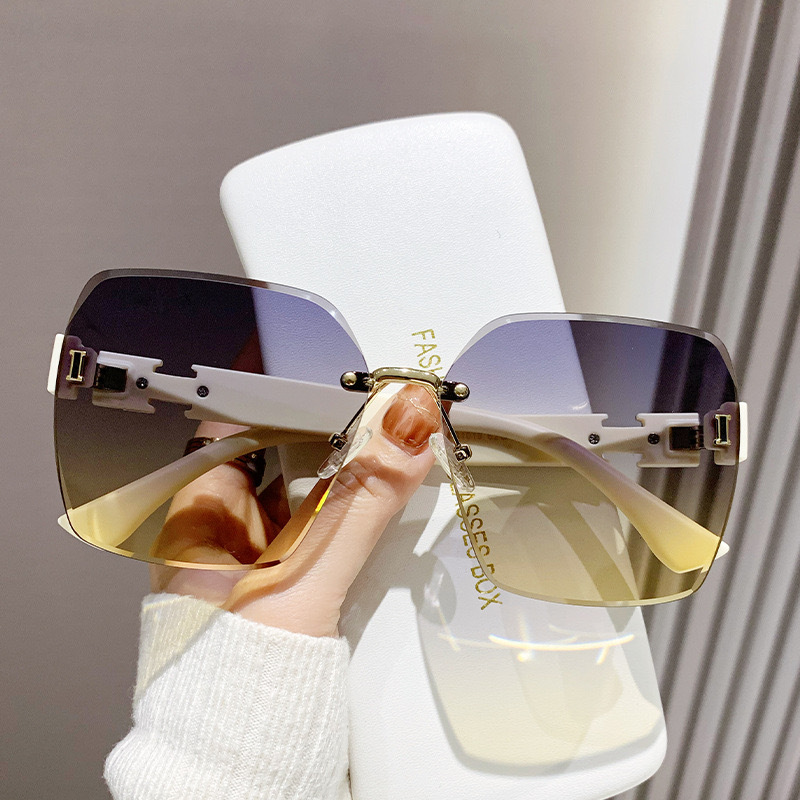 抖音爆款爱尔玛同款墨镜高级感无框太阳镜女款防紫外线开车遮阳镜