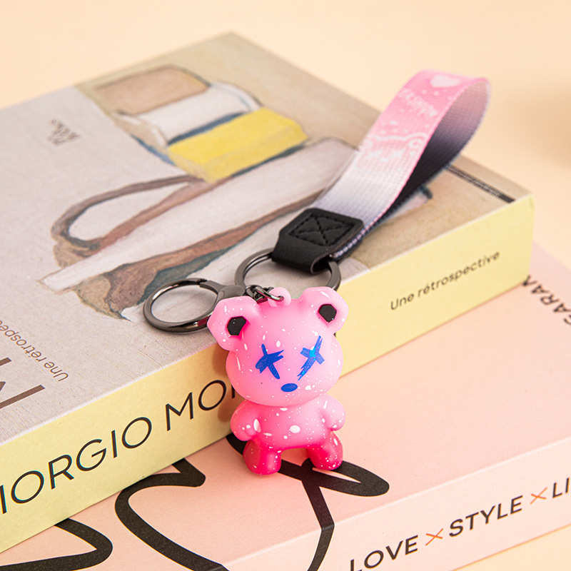 Creativo, colorido, violento, muñeca de oso de dragón, método de lucha de perros, llavero de muñeca de moda, llavero de personalidad de coche