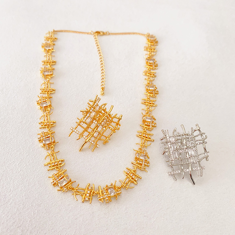 Woven stone inlay with zircon