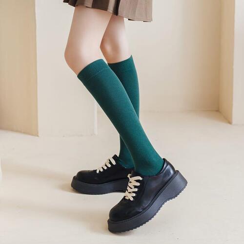 Autumn and winter calf socks solid color cotton Korean version slimming with heel beautiful leg socks women's trendy version pressure socks factory wholesale