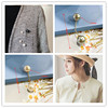 Clothing, protective underware, brooch, pin, brace, skirt, cardigan from pearl