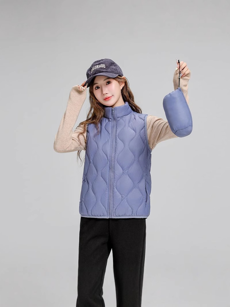 Chaqueta de plumón casual ligera de mujer moda polifacética blanca ligera caliente invierno y otoño abrigo delgado grande