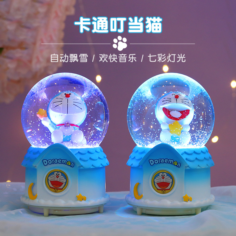 Nueva bola de cristal Doraemon Jingdang gato caja de música automática nieve azul claro grasa regalo de vacaciones