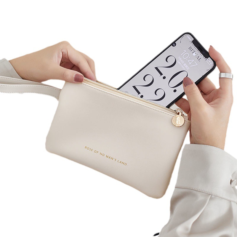 Bolsa de teléfono móvil para mujeres 2023 nuevo cuero ligero portátil de alto grado Mini bolsa de cosméticos de almacenamiento pequeño impermeable