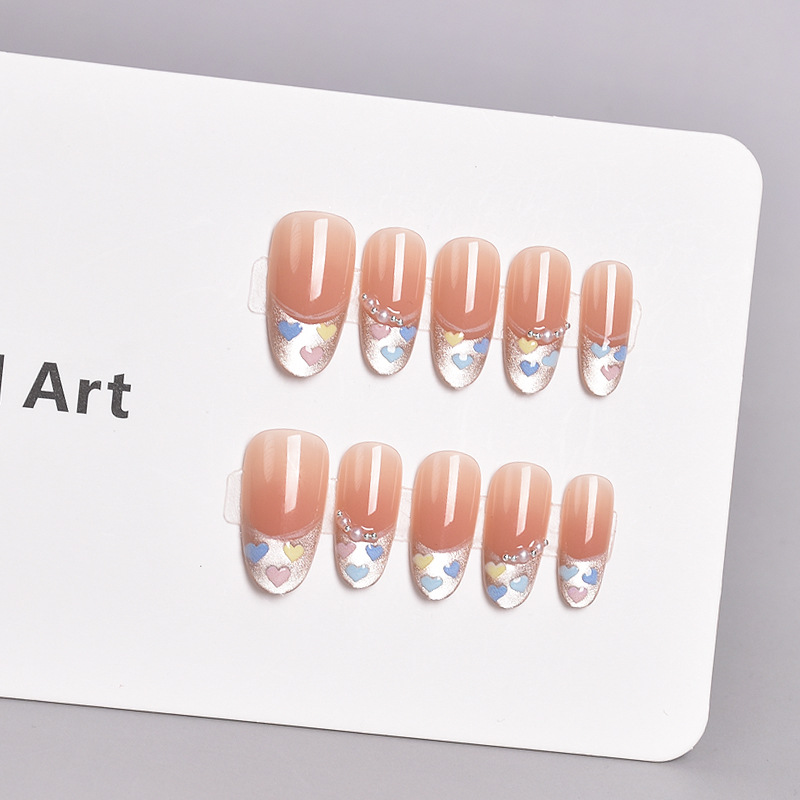 El producto terminado de la pieza de uñas de arte de uñas de uso ovalado medio muestra una armadura prefabricada hecha a mano desmontable, armadura de ojos de gato francés, deseo puro