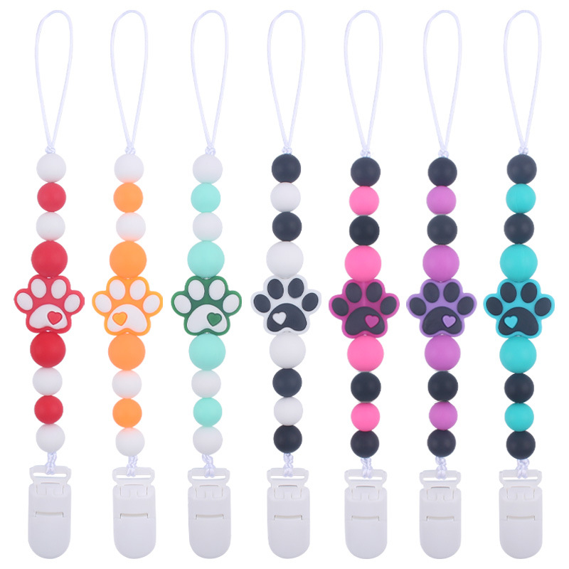 Nuevo bebé suministros dibujos animados perro garra goma creativo bebé lindo silicona mordedura pezón cadena anti-gota cadena